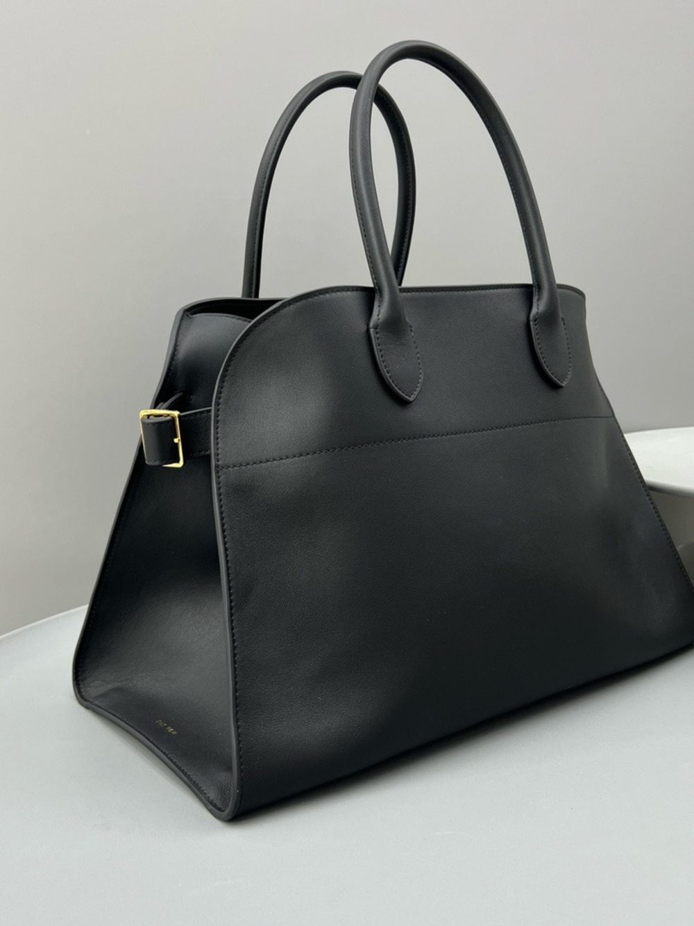 The Row Black Leather Top-Handle Tote with Gold Buckle